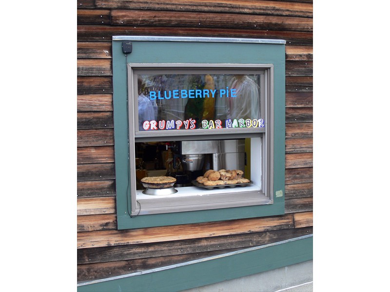 Blueberry pie and muffins cooling in the window